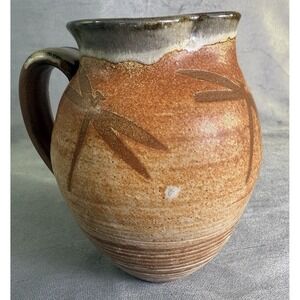 Studio Art Pottery Dragonfly Stamped Handle Pitcher Orange Textured Finish 7.5"